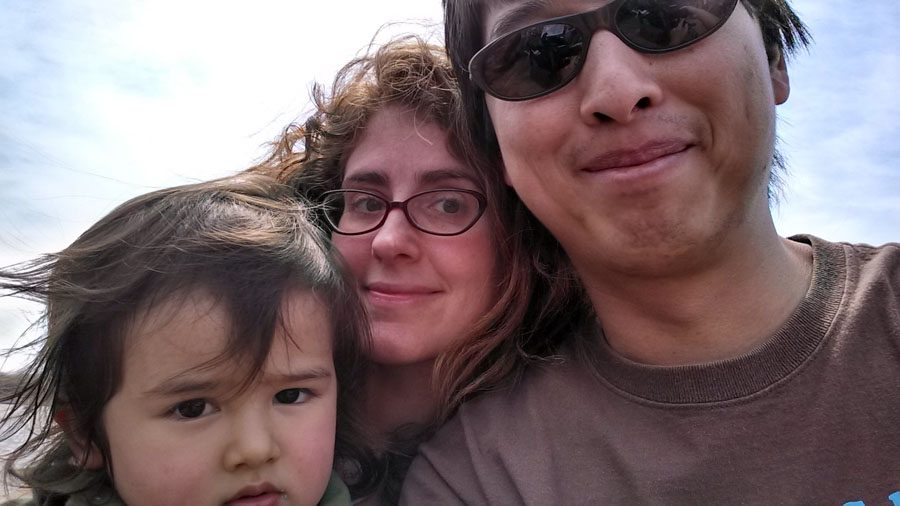 Ezra Liu, Sarah Kate Burgess and Jacque Liu took a family selfie near their home. 2014. 