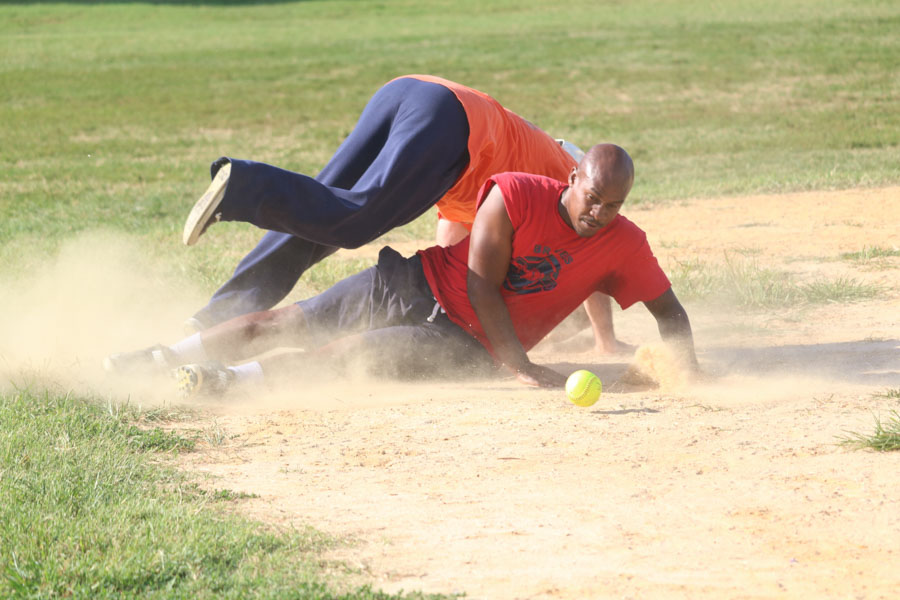 Brandon Mundy makes it safely to third base during the 10th annual Step Up to the Plate: Strike Out Violence softball game. /Kaitlyn Moore