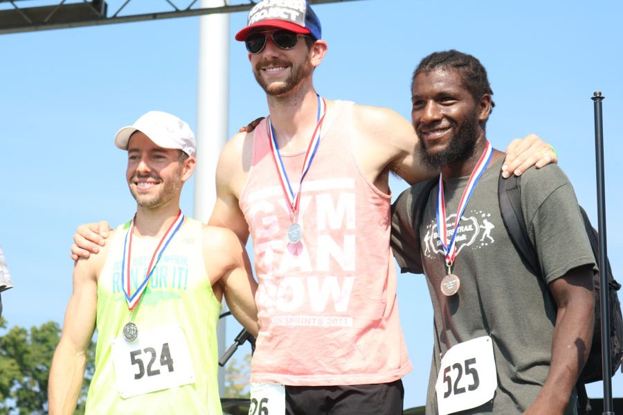 The top three men’s division winners of the fifth annual Boxers’ Trail 5k pose for a photo.