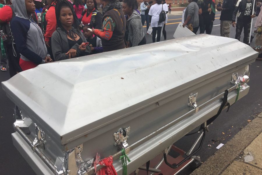 An empty coffin represented the men and women lost to gun violence, and it symbolized the vision the communities have to no longer see such senseless violence happen. 