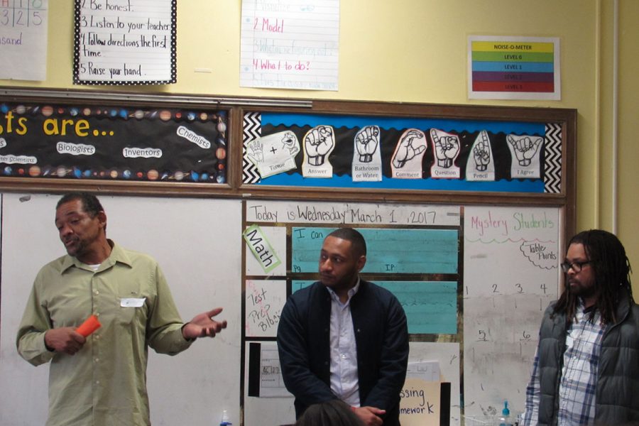 From left to right: Mr. Dunn, Anton Hackett, Kevin Royster all read to children on Read Across America Day