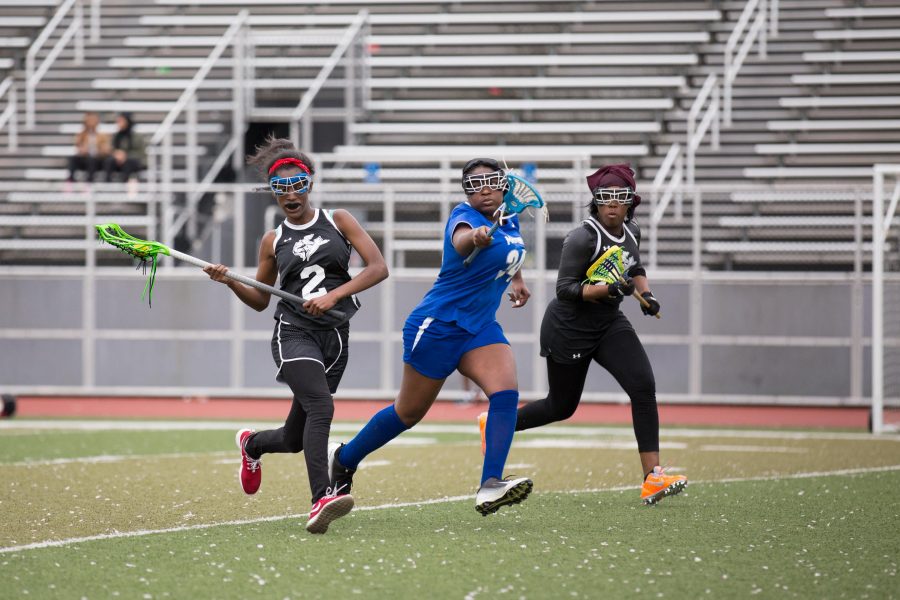 Nadirah “Na” Gateword cradles the ball as she advances towards to opposing goal. /Patrick Clark